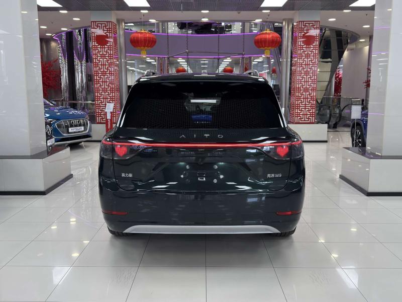 Aito M9  Гибрид 1.5 л. 496 л.с. автомат полный
