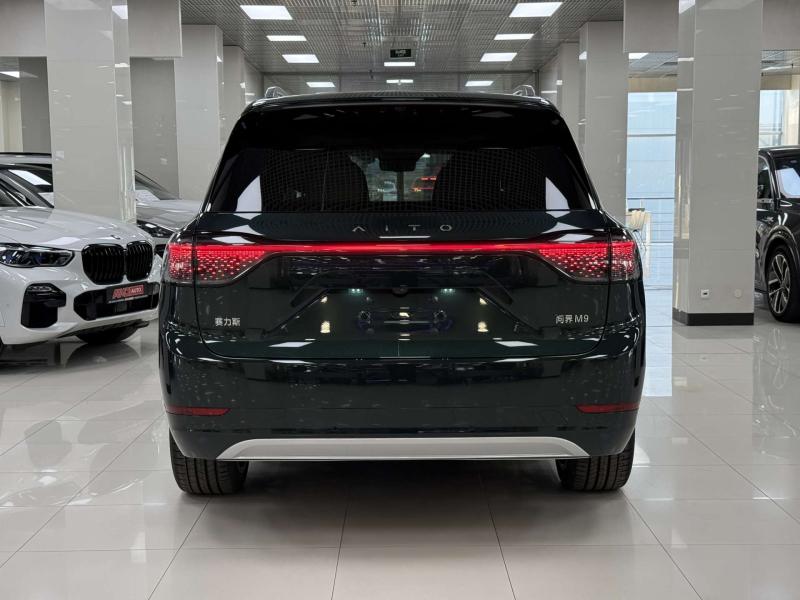 Aito M9  Гибрид 1.5 л. 496 л.с. автомат полный