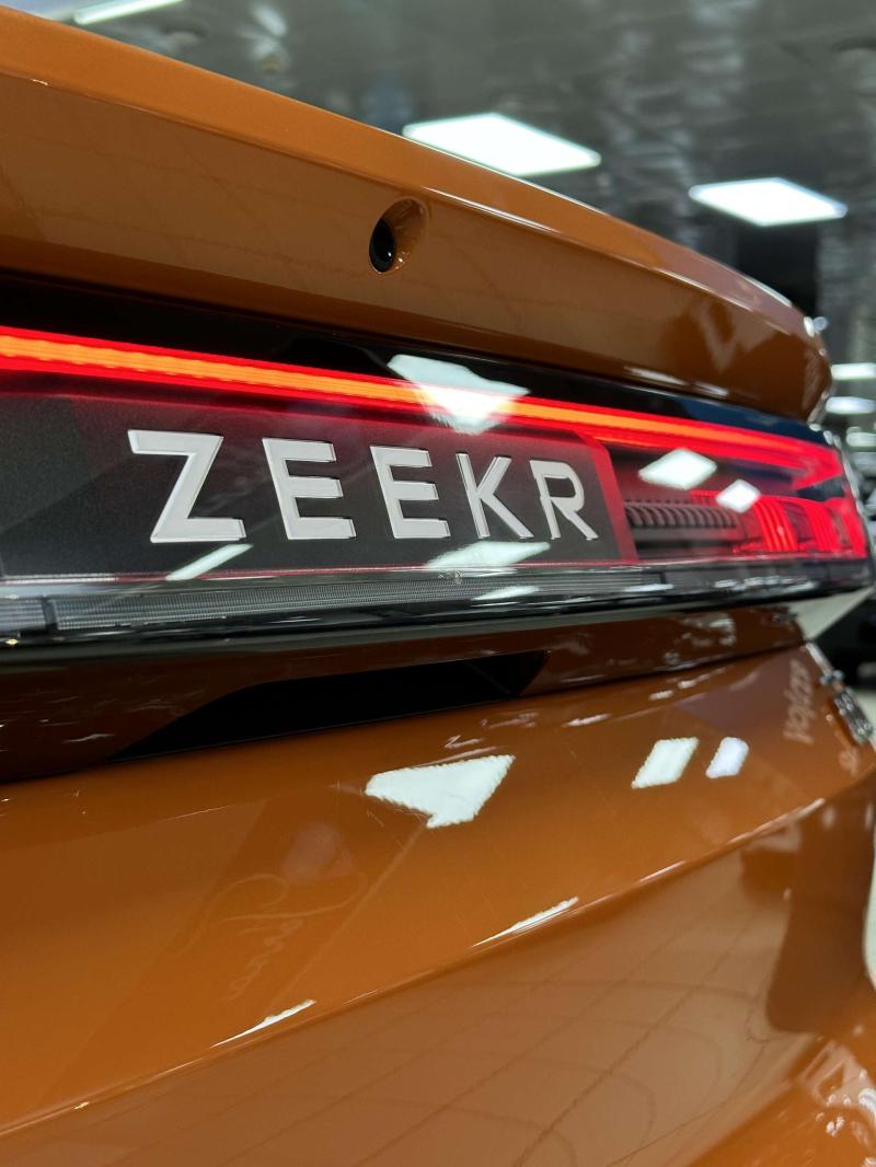 Zeekr 001 1 поколение AT 4WD (544 л.с.)  2023 L6T79T2E7PP054610 Транзит  Оранжевый